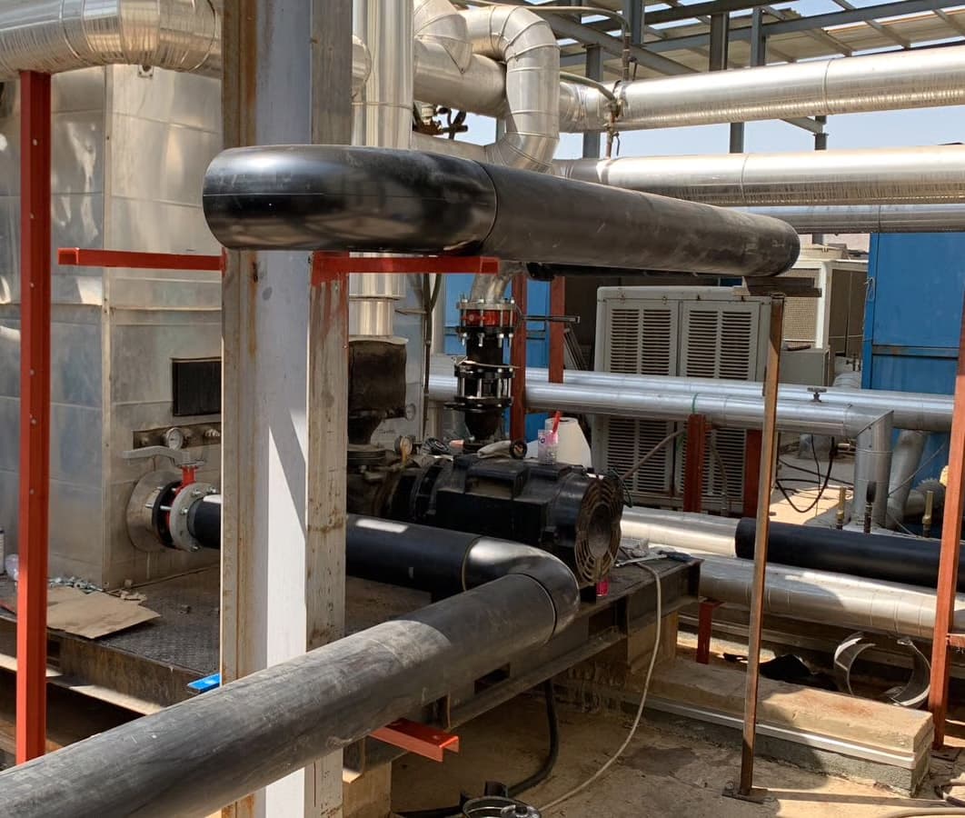Industrial chiller piping during reinstallation in Saudi Arabia
